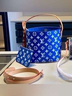 Blue monogram Leather Bucket Bag with Wristlet/wallet